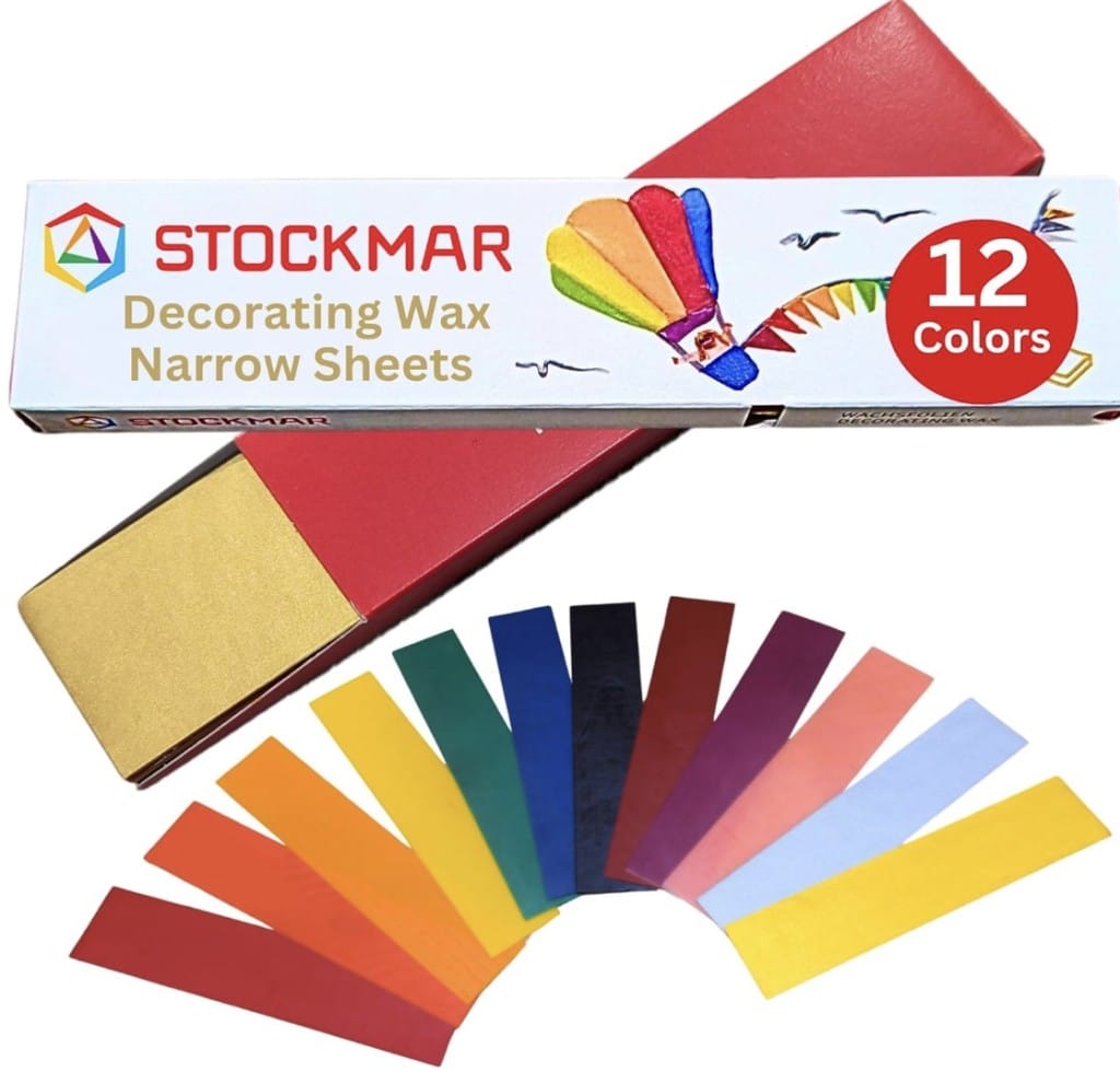 A box of Stockmar decorating wax narrow sheets, labeled "12 Colors." The image shows the box open with the vibrant wax sheets fanned out below, perfect for my favorite spring crafts. Displaying a variety of colors including yellow, red, blue, and more.